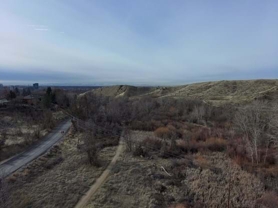 Aerial view of Curlew Connection Trail with overhead powerlines.