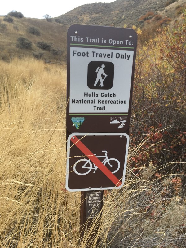Foot travel only sign at trailhead. 