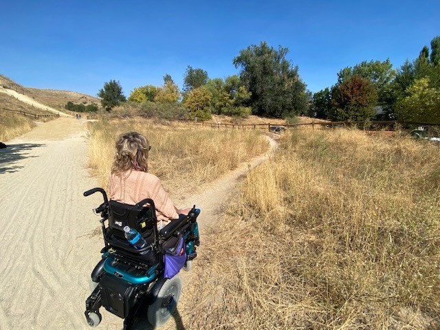 Dana Contemplates The Sandy Road And Narrow Trail